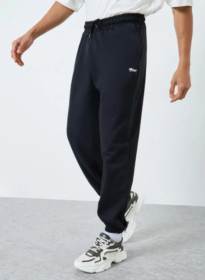 Styli Men Black Solid Fleece Oversized Joggers